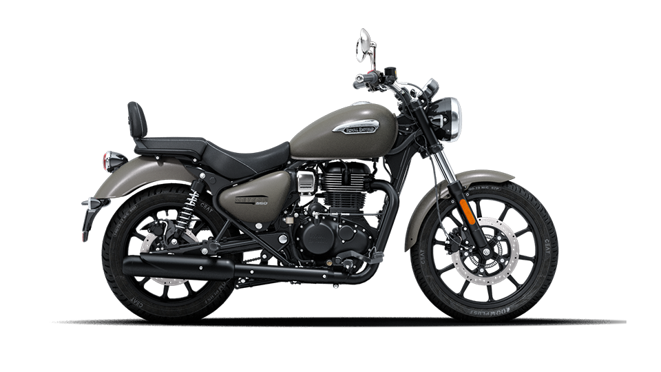 A stellar matt grey coloured royal enfield meteor 350 motorcycle is stationary, displayed on a white background.